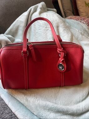 Dooney and  Bourke red pebbled Barrel bags Like new